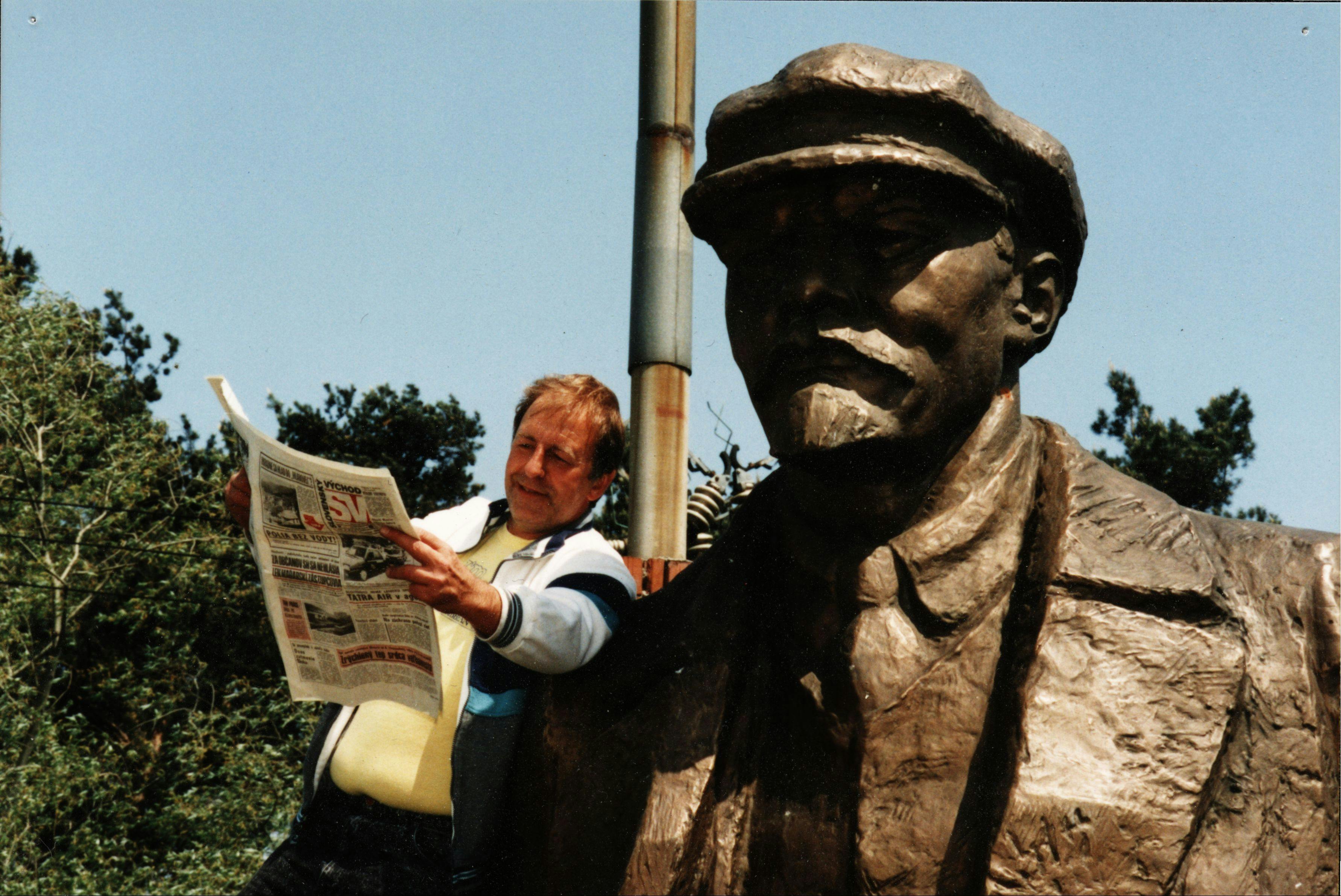 Lew reading a story about his Lenin in a local paper called Slovenský východ